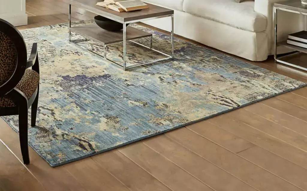 Patterned area rug in living room | Carpet Warehouse